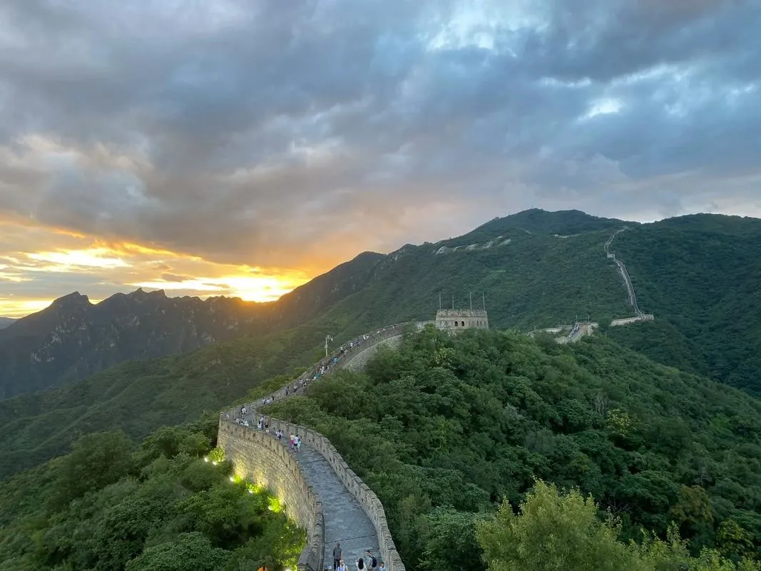 The Great Wall at Mutianyu winding through green mountains