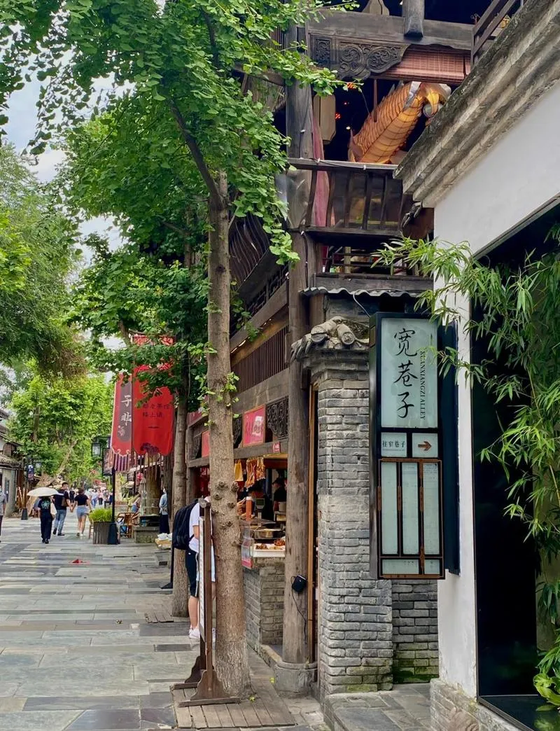 Old Chengdu lane at Kuanzhai Alley with traditional architecture and a lane sign
