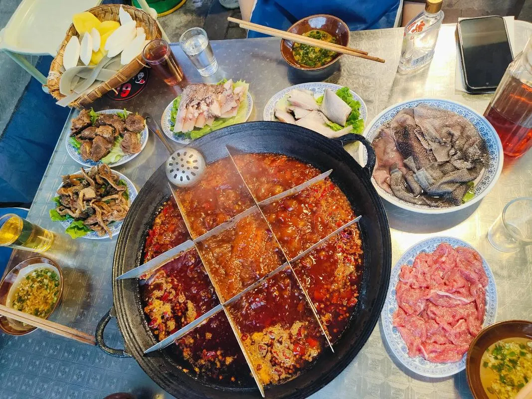 A nine-grid hot pot with red chili oil