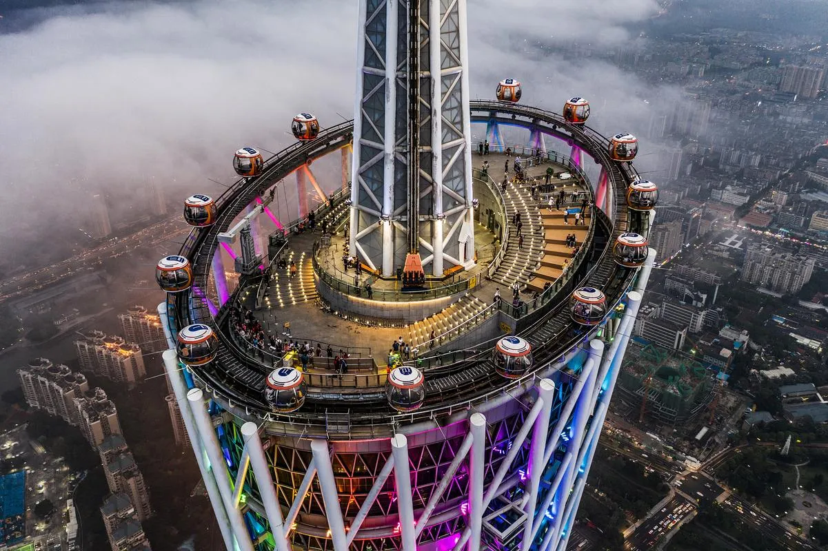 Canton Tower at night, with the Ferris wheel near the top