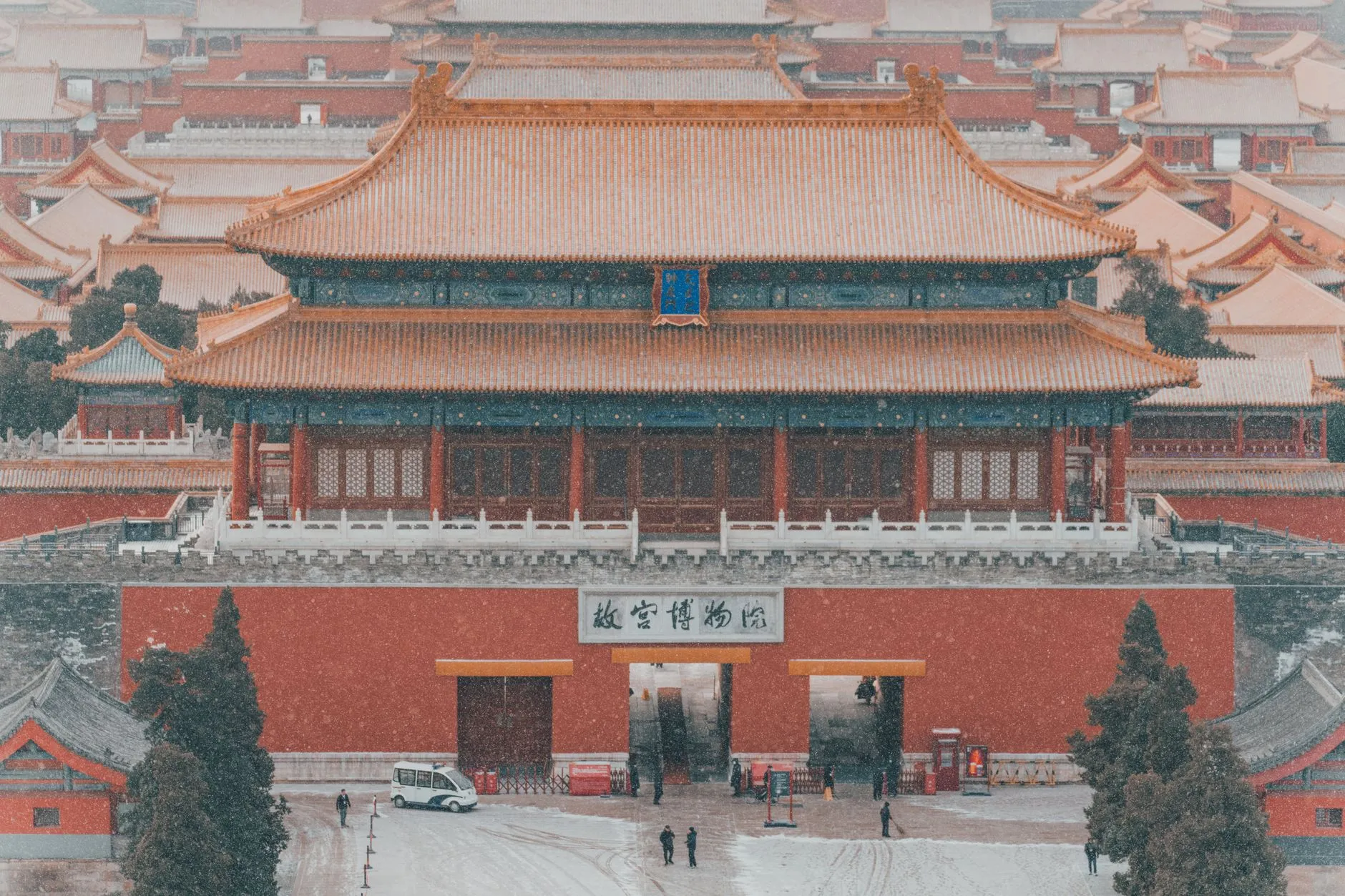 Aerial view of the Forbidden City in Beijing covered in snow