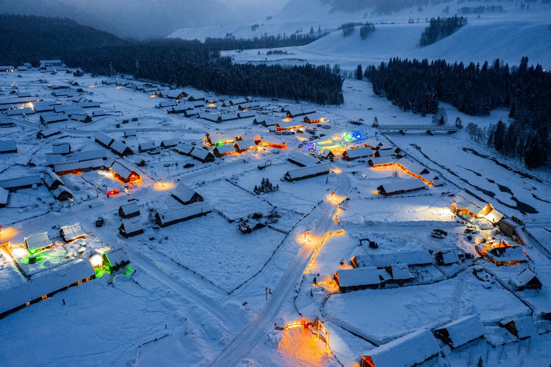 Aerial view of a snow-covered village in Altay Prefecture, Xinjiang