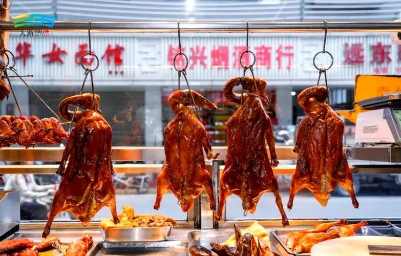 Cantonese roast goose hanging in a siu mei shop window