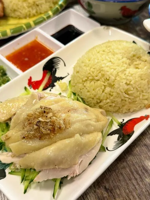 Hainan Chicken Rice — poached chicken with chicken-fat rice and three dipping sauces