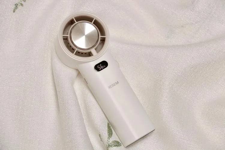 A selection of handheld and portable cooling fans — cheap and everywhere in China