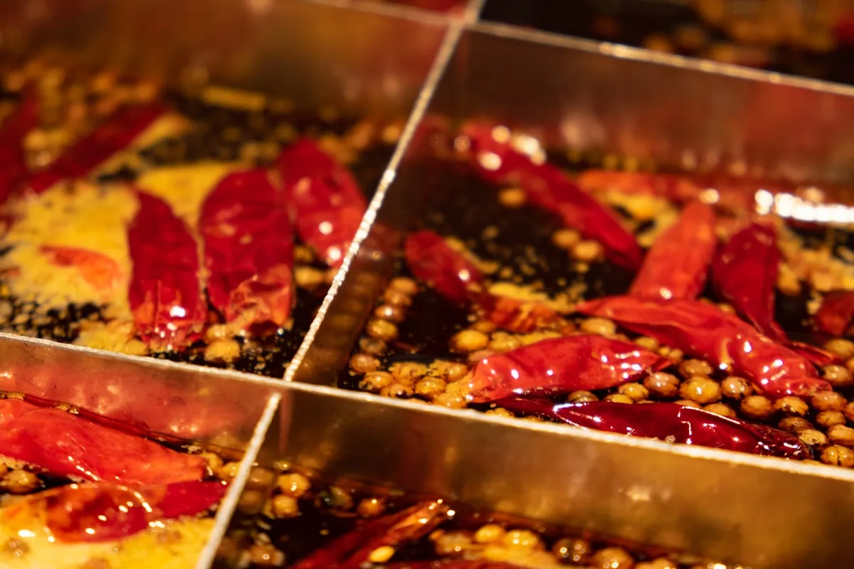 Sichuan hot pot with split yuanyang broth — half spicy red, half mild white